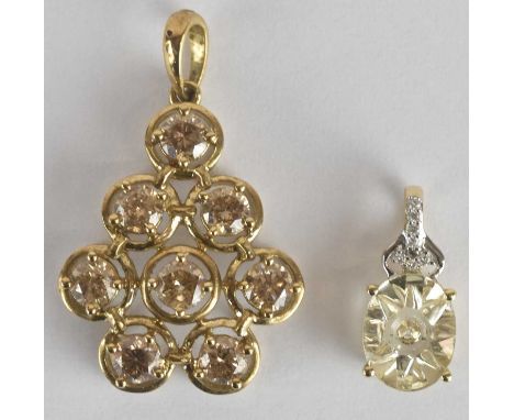 A 9ct yellow gold diamond set pendant, set with eight small round brilliant cut diamonds, each approx 0.2ct, total diamond we