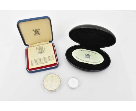 ROYAL CANADIAN MINT; a Queen Elizabeth II, 2000, sterling silver twenty-five cent coin, encapsulated, with certificate of aut