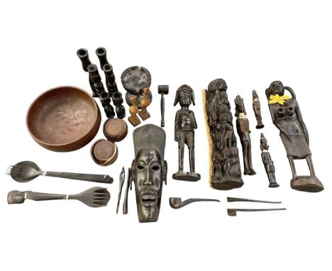 A collection of approximately ten African carved wooden figures, height of tallest 42cm, also two carved wooden fork and spoo