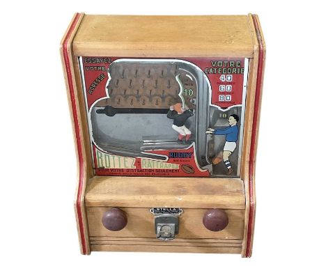 STELLA; a 1950s French rugby penny-in-the-slot arcade/amusement machine, inscribed with maker's plaque to the front and to th