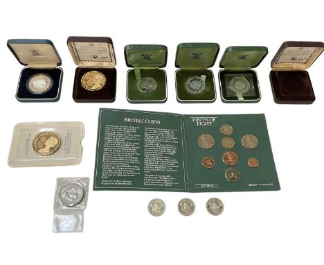 A group of eleven coins comprising a Birmingham Mint 22ct gold plated on solid sterling silver coin, for the Silver Jubilee o