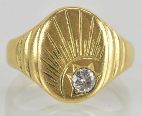 An 18ct yellow gold diamond set signet ring, the diamond approx 0.25ct, size O, approx 8.7g.
