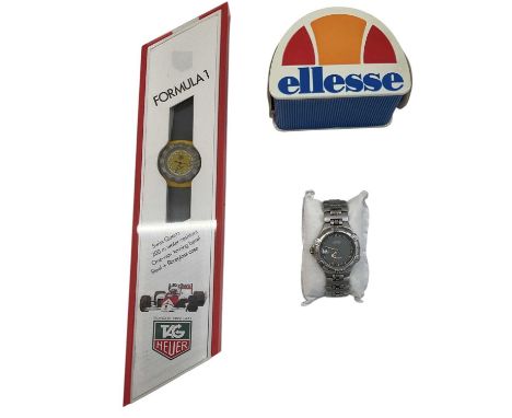TAG HEUER; a Formula 1 watch from 1987, in original presentation case and sleeve, and a unisex Ellesse stainless steel wristw