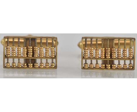 A pair of 14ct gold cufflinks in the form of abacuses, with toggle fasteners, length 1.5cm, combined approx 5.6g.