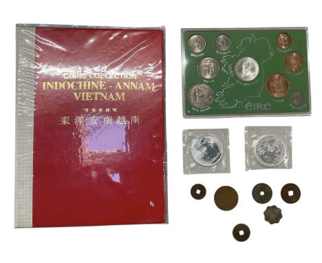 A Vietnamese coin collection, 'Indochine-Annam, Vietnam', a cased Eire Irish year set comprising halfpenny, penny, threepence