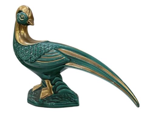 A 1930s Art Deco blue glazed and gilt decorated ceramic figure of a pheasant, height 30cm, length approx 40cm.