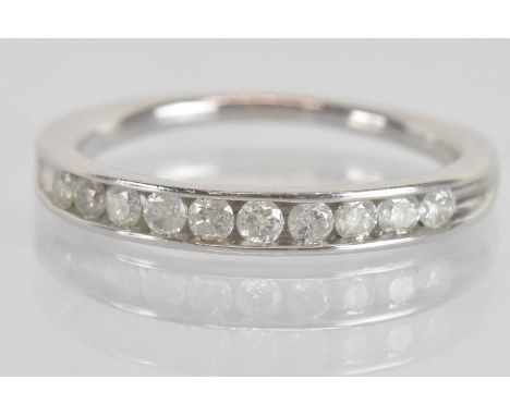 A 9ct white gold diamond set half eternity ring, combined diamond weight approx 0.3ct, size R, approx 3.3g.