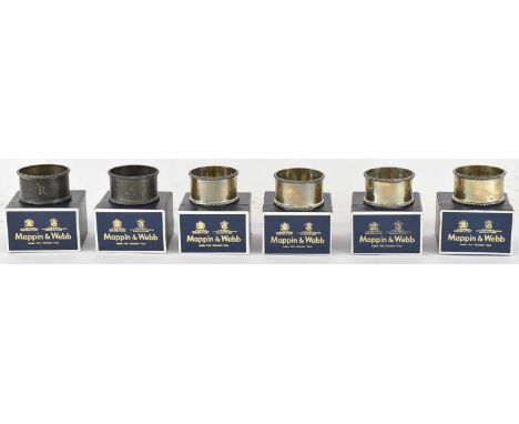MAPPIN &amp; WEBB LTD; a set of six cased Elizabeth II hallmarked silver napkin rings, Birmingham 1985, combined approx 6.3oz