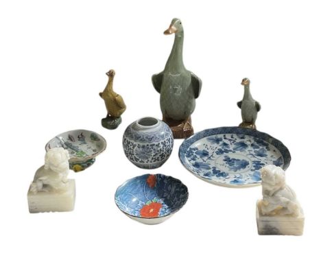 Nine small Oriental decorative items comprising three tin glazed ducks, tallest height 24cm, a pair of carved hardstone Dogs 