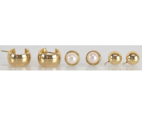 A pair of yellow metal hoop earrings, a pair of yellow metal simulated pearl set earrings and a pair of 14ct yellow gold earr