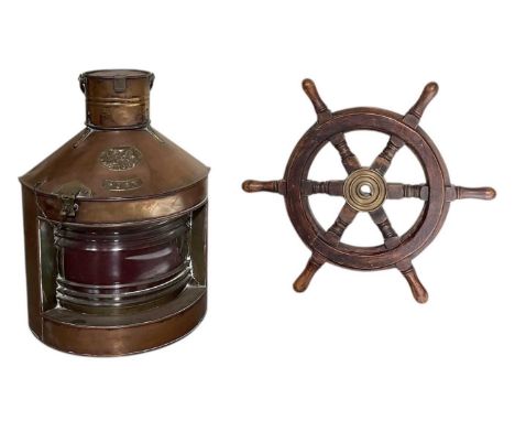 An early 20th century 'Tung Woo' Hong Kong copper ship's lamp, inscribed with plaque, numbered 1085 and inscribed 'Port', hei