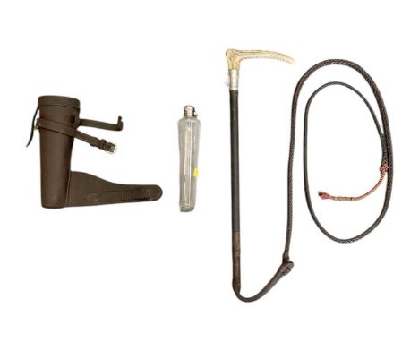 A vintage riding crop with horn handle and silver collar, the silver collar marked 'Fibreglass, Swaine', hallmarked for Birmi