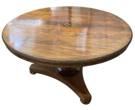 An early 19th century Regency period brass inlaid circular tilt-top tripod breakfast table, diameter of top 120cm.