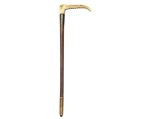 SWAINE &amp; ADENEY LTD; a George V hallmarked silver mounted horn handled riding crop, London 1918, length 54.5cm.