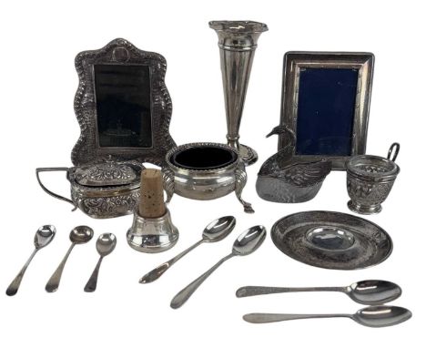 A small collection of silver and white metal, including a small silver trumpet vase (weighted), height 14cm, silver topped bo