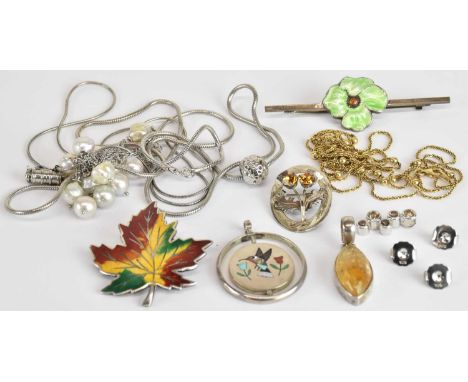 A group of sterling and 925 silver jewellery, including two Scandinavian enamelled brooches, a Scottish thistle orange stone 