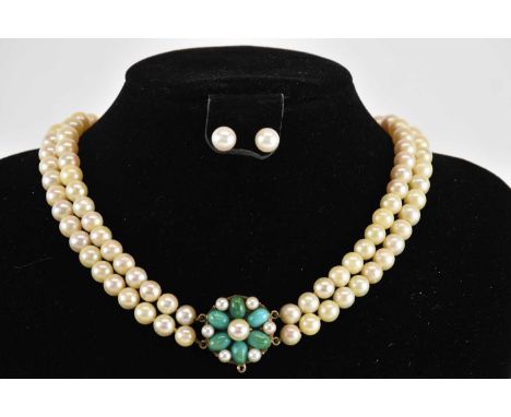 A cultured pearl two strand necklace, with yellow metal clasp set with green hardstones and seed pearls, length approx 40cm, 
