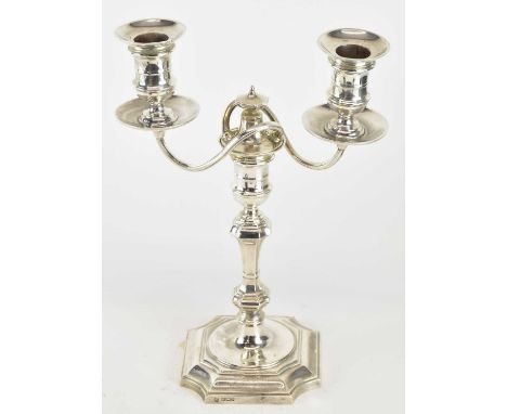 HAWKSWORTH, EYRE &amp; CO LTD; a Victorian hallmarked silver two branch candelabrum, the two sconce two branch detachable top
