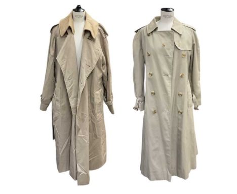 BURBERRY; a lady's beige overcoat, with matching gentleman's beige overcoat, both with signature Burberry tartain interior, s