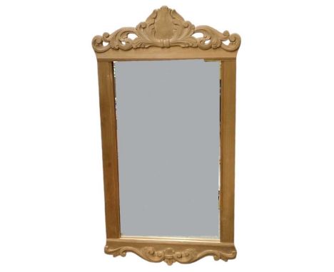 KROGENES MOBLER; a modern Scandinavian pine framed rectangular wall mirror, with carved decoration, 100 x 54cm.