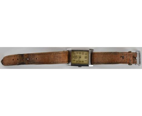 A gentleman's vintage wristwatch of tank shape, the dial set with Arabic numerals, outer minute track and smaller subsidiary 
