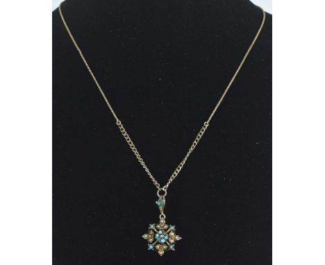 A 9ct yellow gold turquoise and seed pearl set pendant, suspended on 9ct yellow gold fine link necklace, length approx 20cm, 