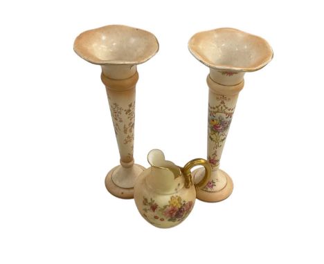 ROYAL WORCESTER; a small blush ivory hand painted floral decorated porcelain jug, height 10cm, and a pair of Crown Ducal blus