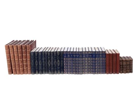HERON BOOKS; a set of thirteen blue gilt tooled leather bound books including 'A Voyage Round the World', 'Travels', 'Seven Y