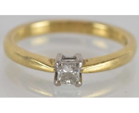 An 18ct yellow gold square cut diamond solitaire ring, the diamond approx 0.15ct, size M, approx 3.9g.