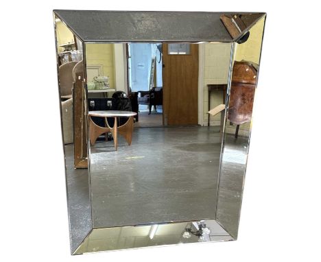 A modern rectangular wall mirror with bevelled glass, 95 x 75cm.