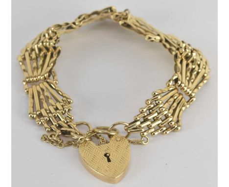 A 9ct yellow gold gate link bracelet, with padlock clasp, length approx 20cm, approx 23.8g.