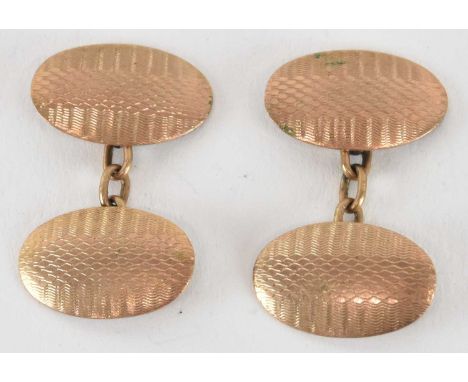 A pair of 9ct yellow gold oval cufflinks, with engine turned decoration, combined approx 4.5g.