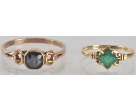 A 9ct gold ring with claw set square emerald, size L, and a further 9ct gold dress ring with a bezel set cushion cut blue gem