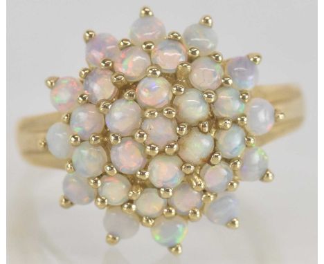 A 9ct gold opal cluster dress ring, size Q, approx 4g.