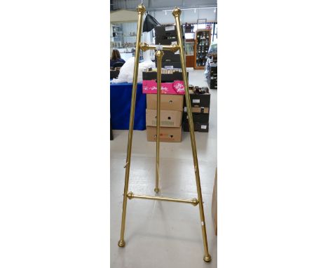 Reproduction brass easel: Reproduction brass easel.