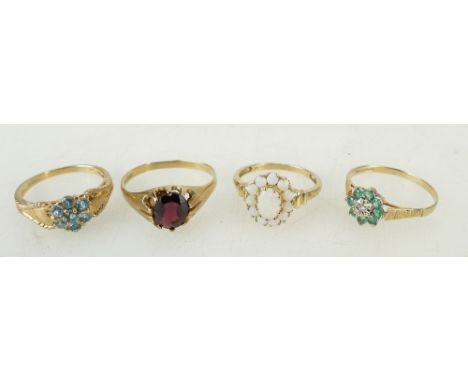 Collection of 9ct gold rings: Four 9ct gold gem set rings, including Opal, Garnet, Topaz etc., gross weight 9g.  