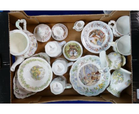 A collection of Royal Doulton Brambley Hedge patterned dinner ware: including seasonal plates, cups, prototype tea pot etc 