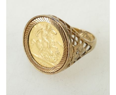 Half sovereign ring: 1894 half-sovereign 22ct gold coin in 9ct setting, gross weight 8.4g. Size V1/2.