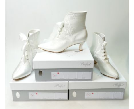 A collection of Perfect Vintage branded Wedding Boots: Style Audrey in sizes 9, 8 and 5.    (3)