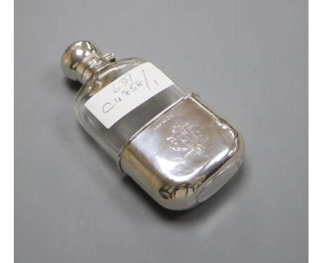 A Victorian silver mounted glass hip flask by James Dixon &amp; Sons, Sheffield, 1889, 13.5cm.