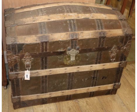 A Victorian brass studded, ash bound domed topped leather trunk