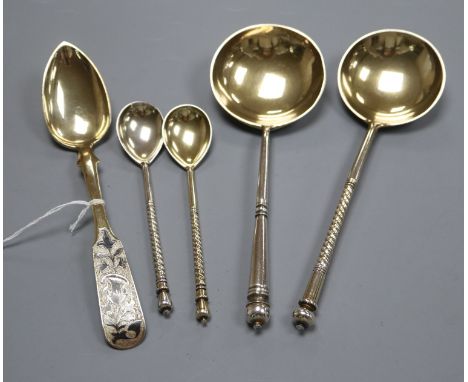 A Russian 84 zlotnik silver gilt and niello spoon, assay master probably Andrei Koralsky, 1842, L 17.5cm and four other Russi