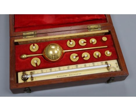 A cased Sikes' Hydrometer, T. O. Blake label