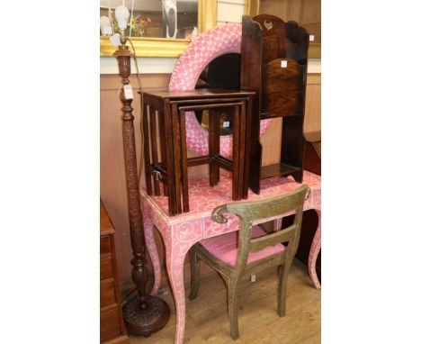 An Indian carved standard lamp, a nest of three rectangular oak tea tables and an oak paper rack