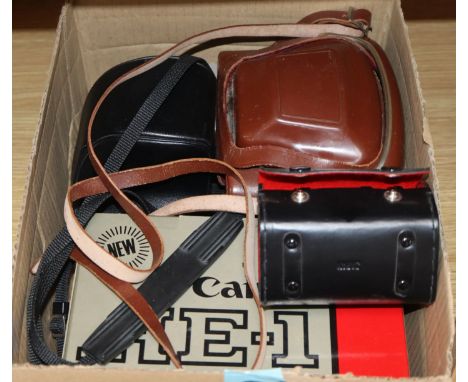 A Canon AE-1 Program SLR camera with box and lenses, a Kodak Auto Colorsnap 35 and a Minolta Vectis 40