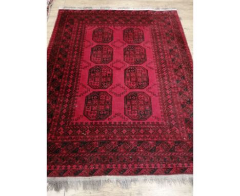 An Afghan carpet 195 x 150cm