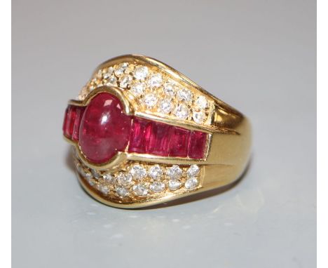 A modern 18ct gold, ruby and diamond cluster dress ring, size K