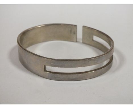 A WHITE METAL BANGLE