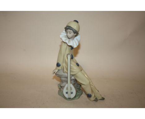 A NAO FIGURE OF A YOUNG MAN WITH A LUTE