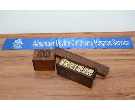A set of 19th century POW bone and ebony dominos, 28 in total, together with a cribbage board and an oak box, thank you for l